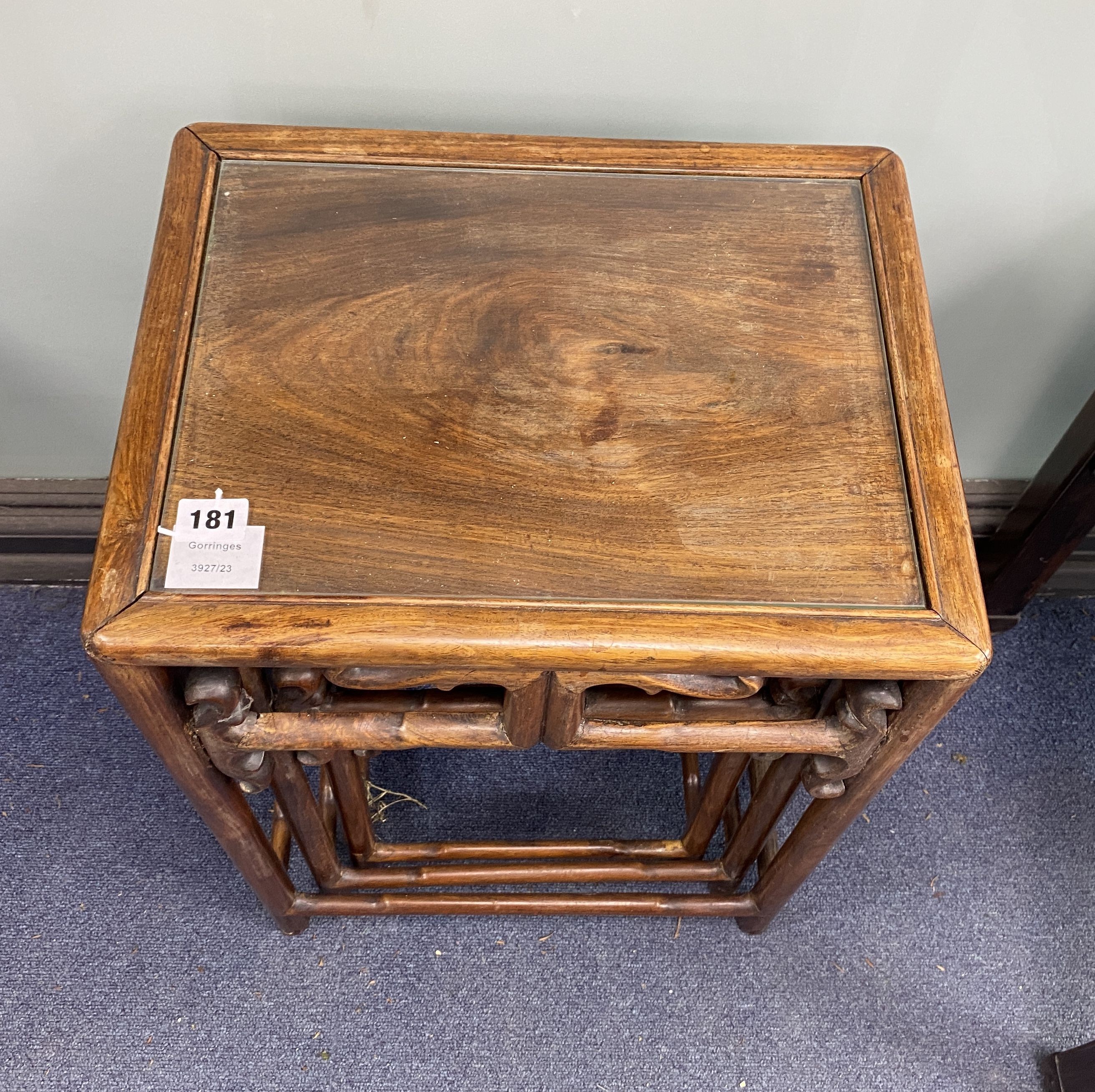 A nest of three Chinese hardwood tables, width 40cm, depth 32cm, height 59cm
